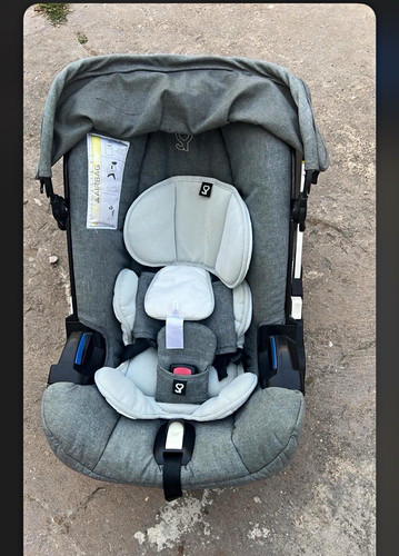 Doona pushchair with newborn